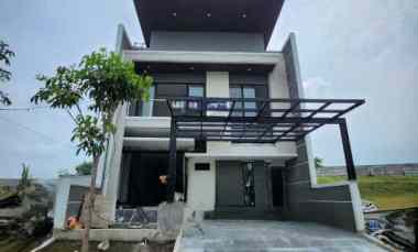 dijual rumah woodland waterfront