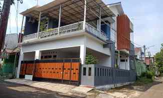 rumah modern 2 lantai posisi hook