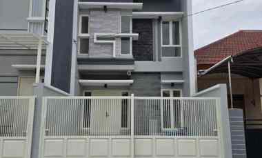 rumah nginden intan timur new minimalis row 3 mobil